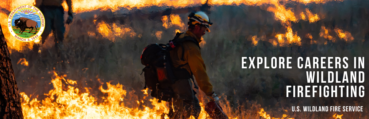A wildland firefighter works on a prescribed fire